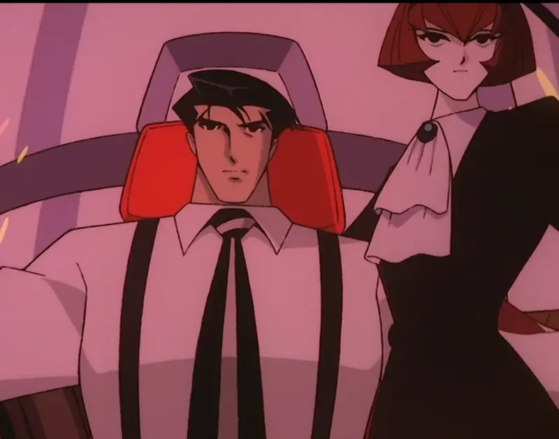 A still from episode 13 of The Big O which was cel animated. Rodger and Dorothy sit in Big O’s cockpit.
