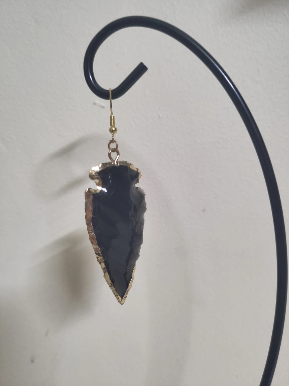 An obsidian arrowhead.