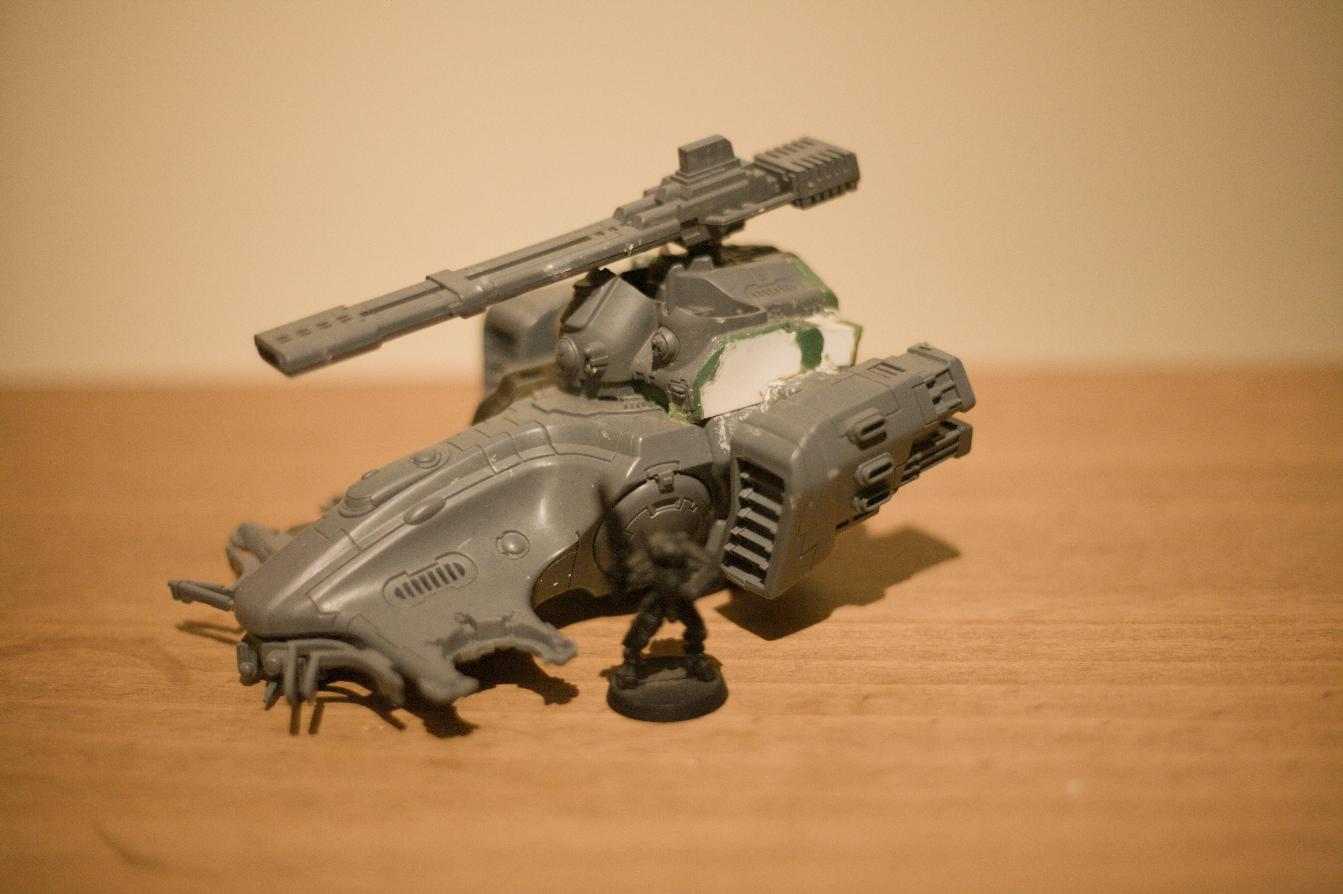 The same figures as before, but with the tank in focus.