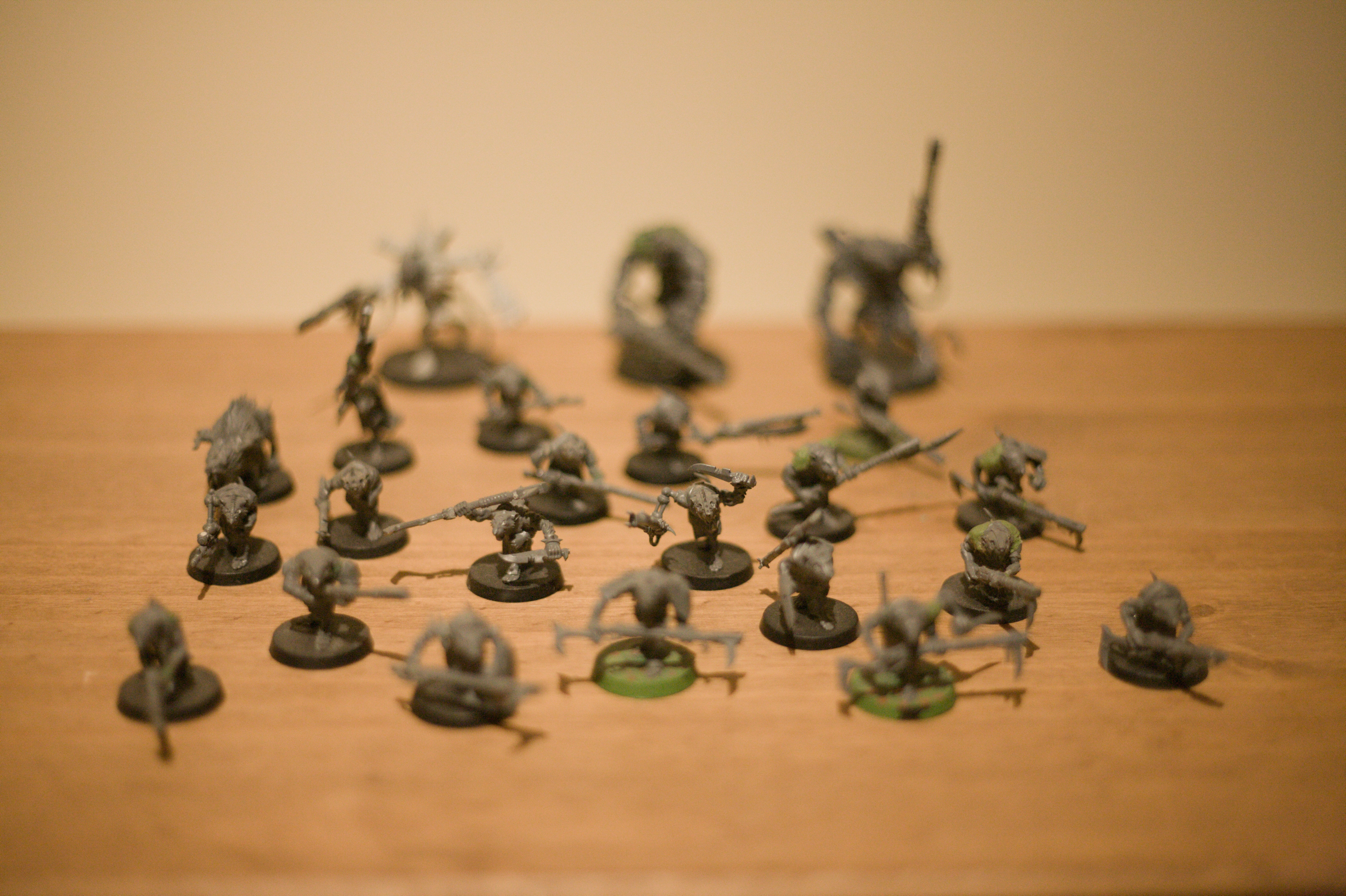 The second row of rat men are in focus  now, showing a few with guns directly attached to robotic arms.