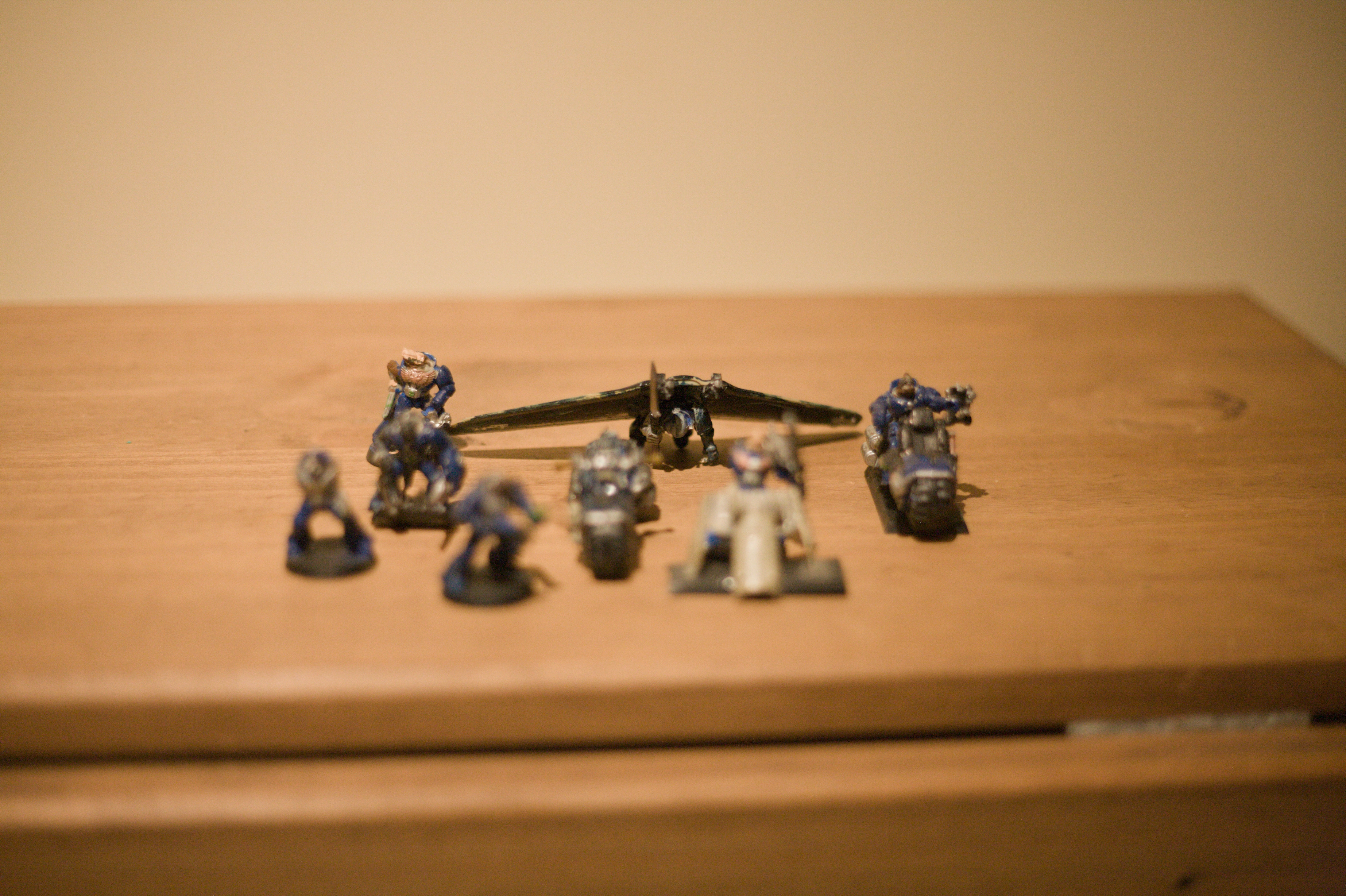 The rat men in power armour but with hang glider in focus.