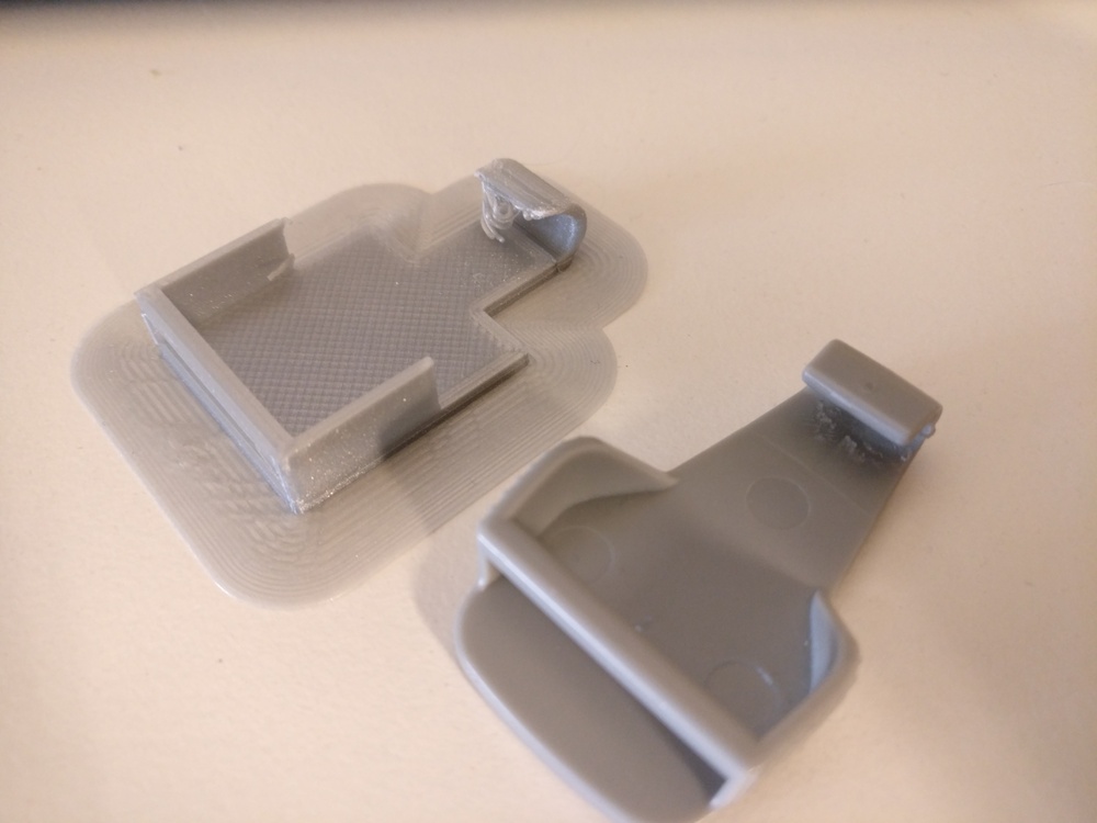 A photo of the 3D printed clip.