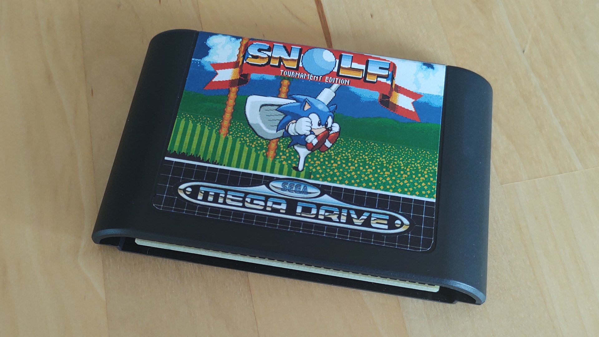 A Snolf: Tournament Edition Mega Drive cartridge.